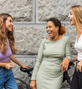 Three friends laughing together