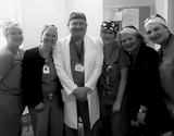 A group photo of Dr. Farrell and medical staff