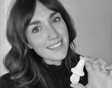 Portrait of Uresta CEO Lauren Barker holding a Uresta.
