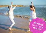 Two women dancing. The discount burst reads "Save 15% with code MDAY15"