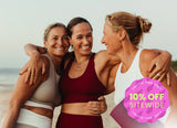 Three women on a beach in active wear, holding a yoga mat. The burst reads: "10% off sitewide. Limited time only."